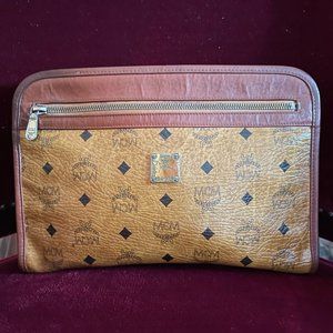 Authentic MCM Visetos Caramel and Tan Coated Canvas Zipper Clutch Purse Handbag